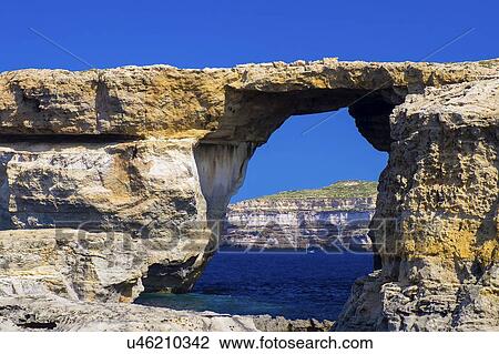 Stock Image - Stone arch, Gozo. Fotosearch