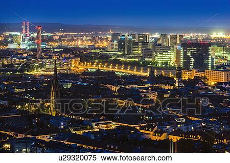 Stock Photography - Switzerland, Basel, Basel-Stadt, Cityscape at night. Fotosearch
