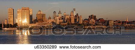 The skyscrapers of Philadelphia rise above the Delaware River at sunrise View Large Photo Image Stock Photo - The skyscrapers of Philadelphia rise above the Delaware River at sunrise. Fotosearch