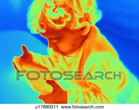 Thermal image of male toddler looking at digital tablet View Large Photo Image Stock Image - Thermal image of male toddler looking at digital tablet. Fotosearch