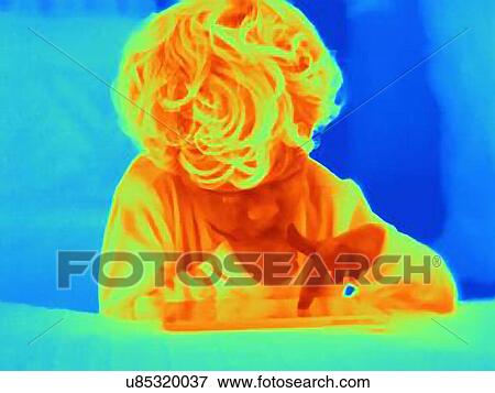Thermal image of male toddler using digital tablet touchscreen View Large Photo Image Stock Photo - Thermal image of male toddler using digital tablet touchscreen. Fotosearch