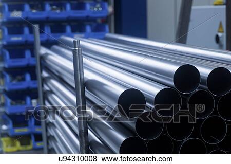 Stock Photo - Tubing, stored in engineering plant, close-up. Fotosearch