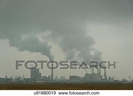Stock Photo - Two coal fired power stations at Maasvlakte, Rotterdam harbour, Netherlands. Fotosearch