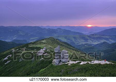 Stock Image - Ukraine, Ivano-Frankivsk region, Verkhovyna district, Carpathians, Chernohora, Mountain landscape at sunset. Fotosearch
