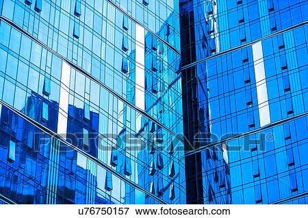 Stock Photo - USA, New York, Distorted reflections in Glass buildings. Fotosearch