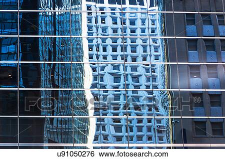 USA, New York, Distorted reflections in office building View Large Photo Image Stock Photograph - USA, New York, Distorted reflections in office building. Fotosearch