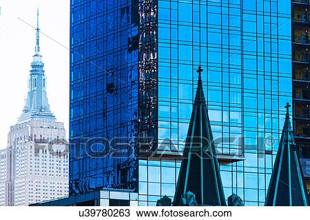 Stock Image - USA, New York, Glass office buildings. Fotosearch