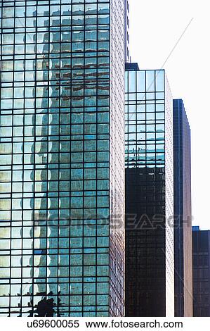 USA, New York, Glass office buildings View Large Photo Image Stock Photography - USA, New York, Glass office buildings. Fotosearch