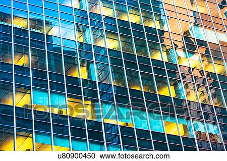 Stock Image - USA, New York, Glassy office skyscraper. Fotosearch