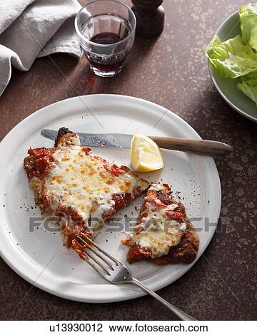 Veal parmigiana on plate View Large Photo Image Stock Image - Veal parmigiana on plate. Fotosearch