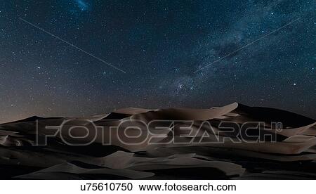 View of dunes under starry night sky, Namib Desert, Namibia View Large Photo Image Stock Image - View of dunes under starry night sky, Namib Desert, Namibia. Fotosearch