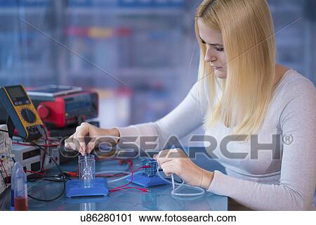 Woman experimenting with fuel cell View Large Photo Image Stock Image - Woman experimenting with fuel cell. Fotosearch