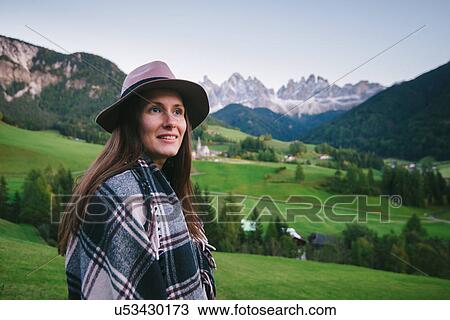 Woman looking into distance, Santa Maddalena, Dolomite Alps, Val di Funes (Funes Valley), South Tyrol, Italy View Large Photo Image Stock Image - Woman looking into distance, Santa Maddalena, Dolomite Alps, Val di Funes (Funes Valley), South Tyrol, Italy. Fotosearch