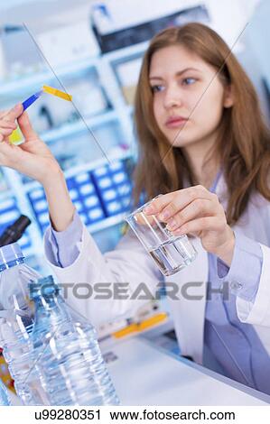 Woman testing water View Large Photo Image Stock Image - Woman testing water. Fotosearch