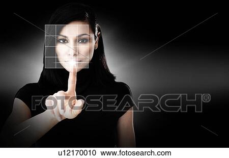 Woman touching virtual screen View Large Photo Image Stock Image - Woman touching virtual screen. Fotosearch