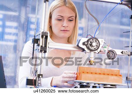 Woman using 3d printer View Large Photo Image Stock Photography - Woman using 3d printer. Fotosearch