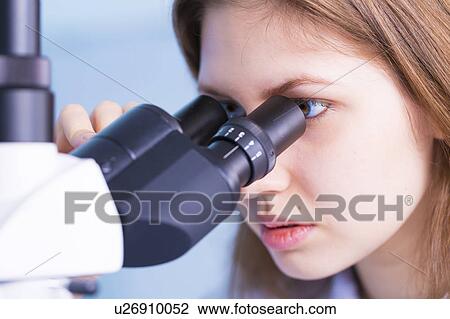 Woman using microscope View Large Photo Image Stock Image - Woman using microscope. Fotosearch