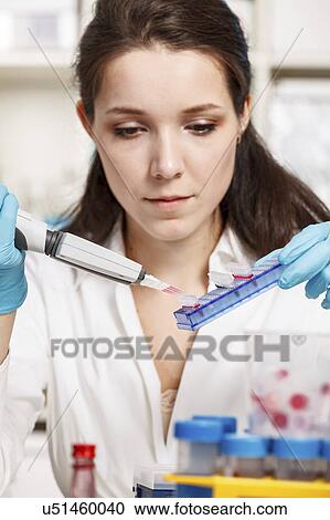 Woman working in microbiology laboratory View Large Photo Image Stock Image - Woman working in microbiology laboratory. Fotosearch