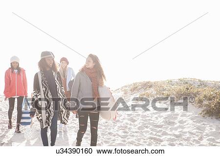 Young adult picnicking friends strolling onto beach, Western Cape, South Africa View Large Photo Image Stock Image - Young adult picnicking friends strolling onto beach, Western Cape, South Africa. Fotosearch