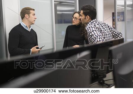 Picture - Young business people having meeting. Fotosearch