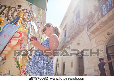 Young girl shopping, Lecce, Italy View Large Photo Image Stock Image - Young girl shopping, Lecce, Italy. Fotosearch