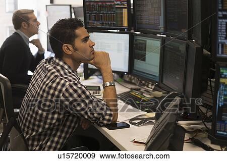 Young traders analyzing computer data View Large Photo Image Stock Photo - Young traders analyzing computer data. Fotosearch