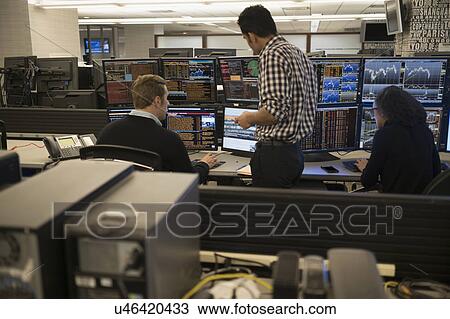 Young traders working in stock market View Large Photo Image Stock Image - Young traders working in stock market. Fotosearch