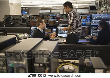 Young traders working in stock market View Large Photo Image Stock Image - Young traders working in stock market. Fotosearch