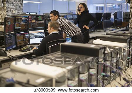 Young traders working in stock market View Large Photo Image Stock Photo - Young traders working in stock market. Fotosearch