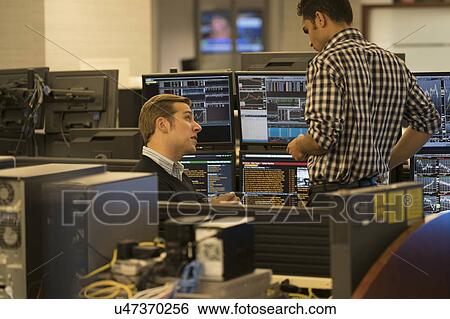 Young traders working in stock market View Large Photo Image Stock Photograph - Young traders working in stock market. Fotosearch