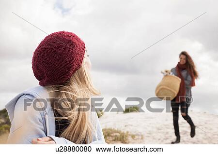 Young woman arriving at beach with picnic basket, Western Cape, South Africa View Large Photo Image Stock Image - Young woman arriving at beach with picnic basket, Western Cape, South Africa. Fotosearch