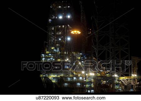 Offshore oil rig at night. View Large Photo Image Stock Image - Offshore oil rig at night.. Fotosearch