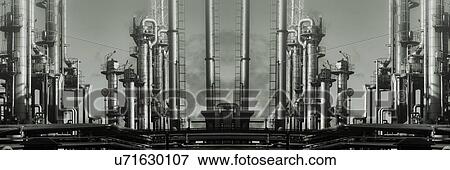 Stock Photo - Oil refinery with chimneys, panoramic.. Fotosearch