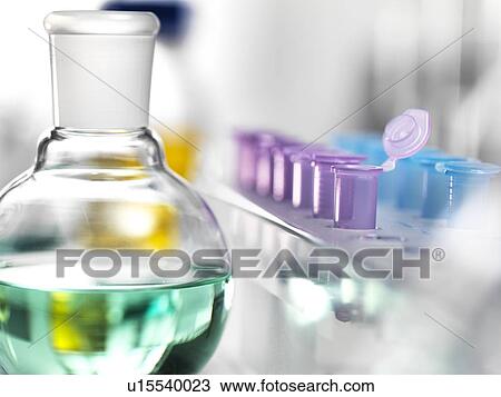 Stock Image - Round-bottom flask and Eppendorf tubes.. Fotosearch