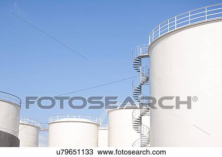 White towers against a blue sky. View Large Photo Image Stock Image - White towers against a blue sky.. Fotosearch