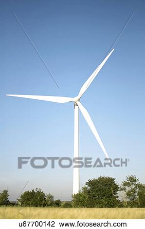 Stock Image - Wind turbine and blue sky. Fotosearch
