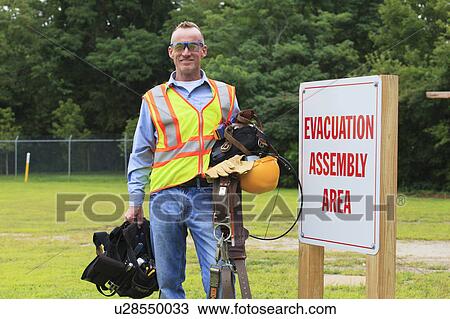Stock Image - Communications engineer at work. Fotosearch