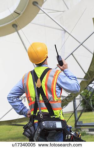 Communications engineer at work View Large Photo Image Stock Photography - Communications engineer at work. Fotosearch