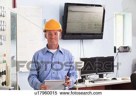 Electrical engineer at work View Large Photo Image Stock Photography - Electrical engineer at work. Fotosearch