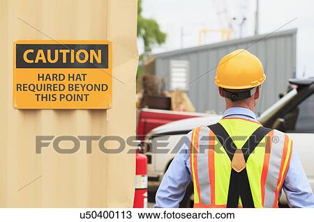 Electrical engineer wearing hard hat View Large Photo Image Stock Image - Electrical engineer wearing hard hat. Fotosearch