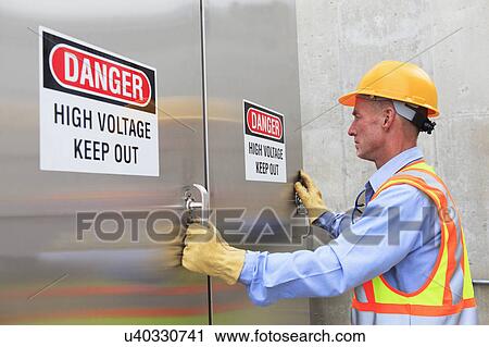 Engineer working in power plant View Large Photo Image Stock Image - Engineer working in power plant. Fotosearch