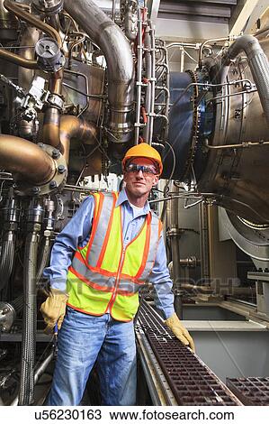 Engineer working in power plant View Large Photo Image Stock Image - Engineer working in power plant. Fotosearch