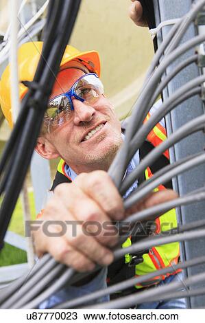 Engineer working in power plant View Large Photo Image Stock Image - Engineer working in power plant. Fotosearch