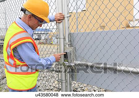 Stock Photo - Engineer working in power plant. Fotosearch