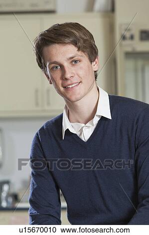 Stock Image - Engineering student in a chemistry lab. Fotosearch
