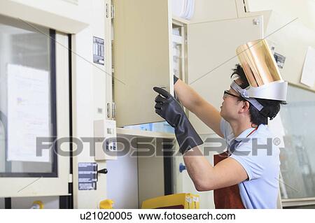 Stock Photography - Engineering student in a chemistry laboratory. Fotosearch