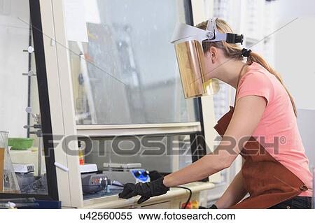 Stock Photography - Engineering student in a chemistry laboratory. Fotosearch