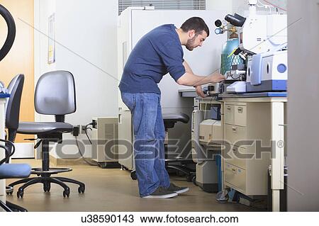 Engineering student in a laboratory View Large Photo Image Stock Image - Engineering student in a laboratory. Fotosearch