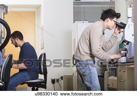 Stock Image - Engineering student in a laboratory. Fotosearch