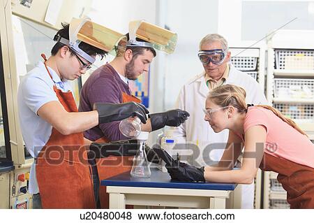 Stock Photo - Engineering students in a chemistry laboratory. Fotosearch